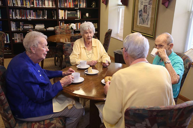 group of seniors at afternoon tea