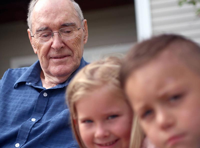 senior man with grandchildren